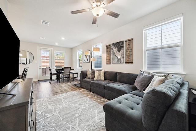 9954 Storehouse Dr, Houston, TX 77080 - living room featuring wood finished floors, ceiling fan, and recessed lighting