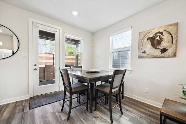 9954 Storehouse Dr, Houston, TX 77080 - dining area with dark wood-style floors, baseboards, and recessed lighting