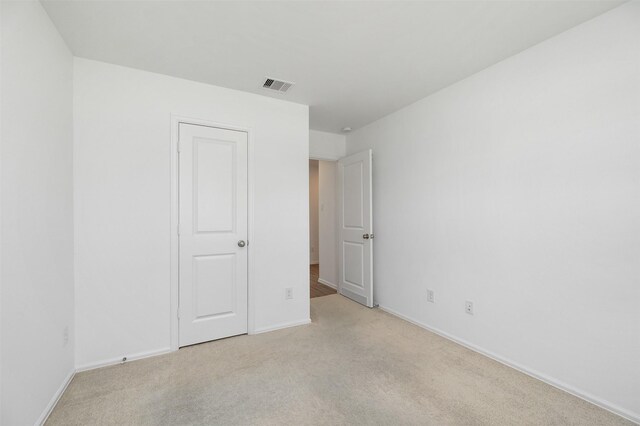 1491 Twilight Green Dr, Katy, TX 77493 - unfurnished bedroom featuring light colored carpet and baseboards