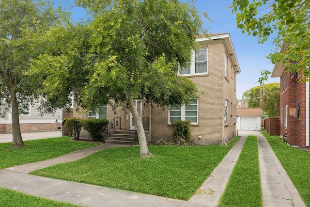 4404 Avenue N 1/2 Ave N 1/2, Galveston, TX 77550 - view of front facade with concrete driveway, brick siding, and a front yard