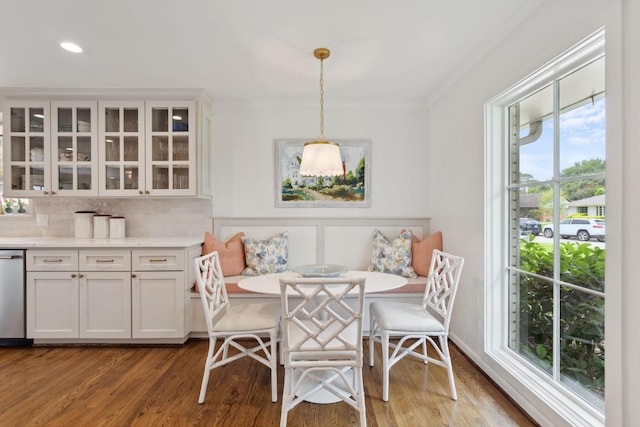 6147 Chevy Chase Dr, Houston, TX 77057 - dining area with crown molding, breakfast area, healthy amount of natural light, wood finished floors, and recessed lighting