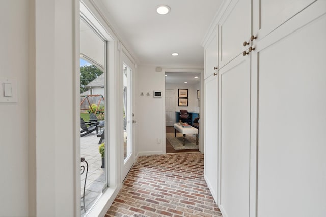 6147 Chevy Chase Dr, Houston, TX 77057 - hallway with brick floors, recessed lighting, and baseboards