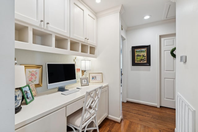 6147 Chevy Chase Dr, Houston, TX 77057 - home office featuring built in desk, dark wood-style flooring, baseboards, recessed lighting, and ornamental molding