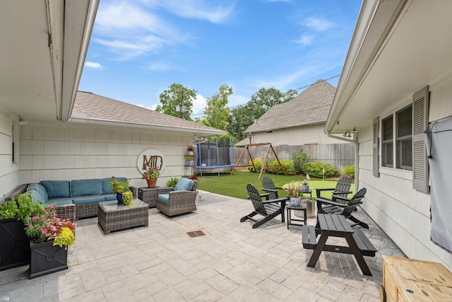 6147 Chevy Chase Dr, Houston, TX 77057 - view of patio / terrace with an outdoor living space and a trampoline