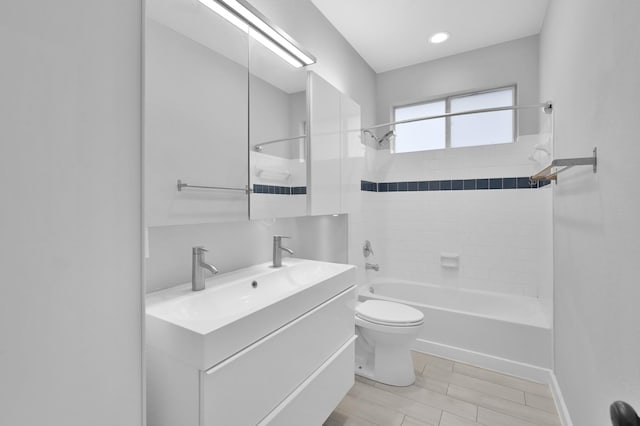 10 Hollylaurel Dr, The Woodlands, TX 77382 - full bathroom with vanity, toilet, and  shower combination