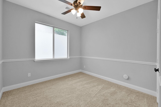 10 Hollylaurel Dr, The Woodlands, TX 77382 - unfurnished room with ceiling fan, baseboards, and carpet floors