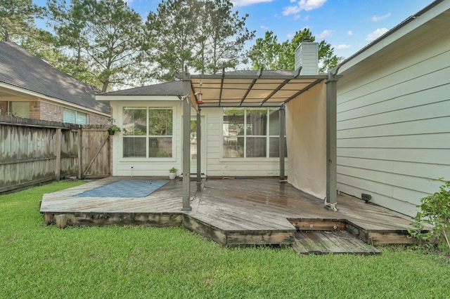 10 Hollylaurel Dr, The Woodlands, TX 77382 - back of property featuring a deck and a chimney