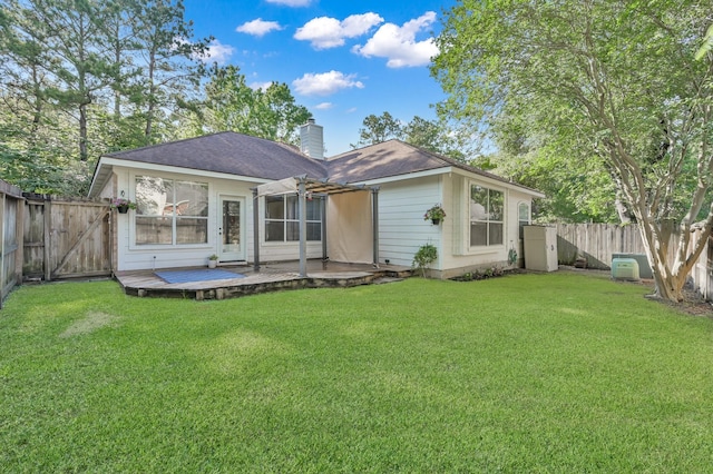 10 Hollylaurel Dr, The Woodlands, TX 77382 - back of house with a wooden deck, a chimney, a gate, and a pergola