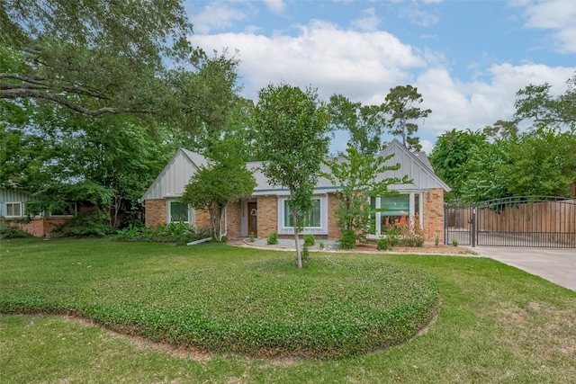 10126 Whiteside Ln, Houston, TX 77043 - ranch-style house featuring brick siding, board and batten siding, a gate, and concrete driveway
