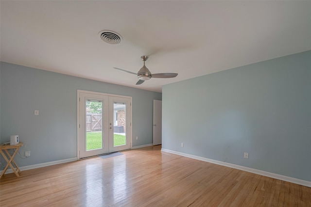 10126 Whiteside Ln, Houston, TX 77043 - unfurnished room with a ceiling fan, french doors, light wood-style flooring, and baseboards
