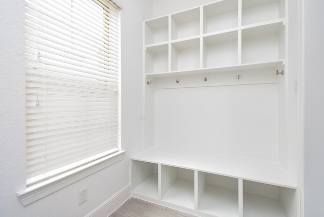 7818 Ludington Dr, Houston, TX 77071 - mudroom featuring baseboards