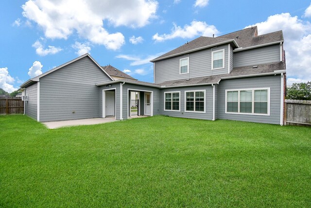7818 Ludington Dr, Houston, TX 77071 - rear view of house with a patio area and a shingled roof