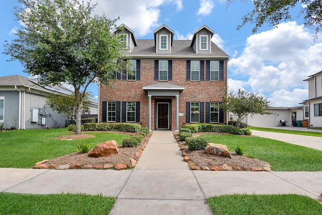 7818 Ludington Dr, Houston, TX 77071 - colonial-style house featuring brick siding and a front lawn