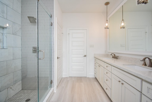 7818 Ludington Dr, Houston, TX 77071 - full bathroom with double vanity and a stall shower