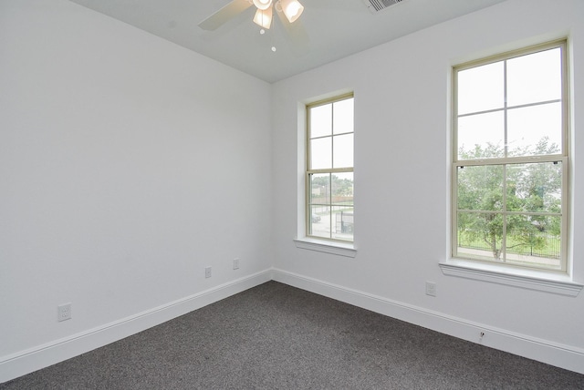 7818 Ludington Dr, Houston, TX 77071 - empty room with baseboards, a ceiling fan, and dark carpet