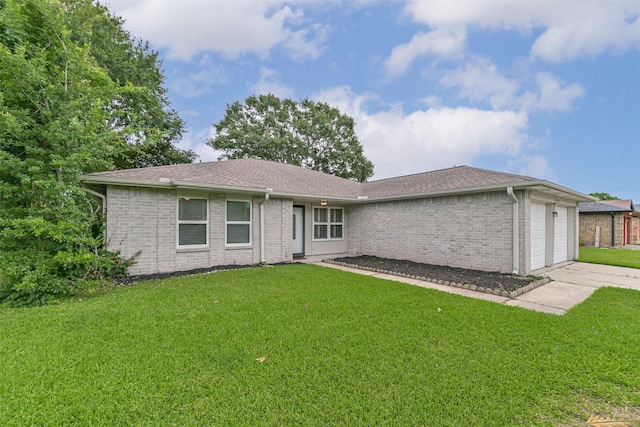 10901 Mesquite Dr, La Porte, TX 77571 - back of house featuring a garage, a yard, driveway, brick siding, and roof with shingles