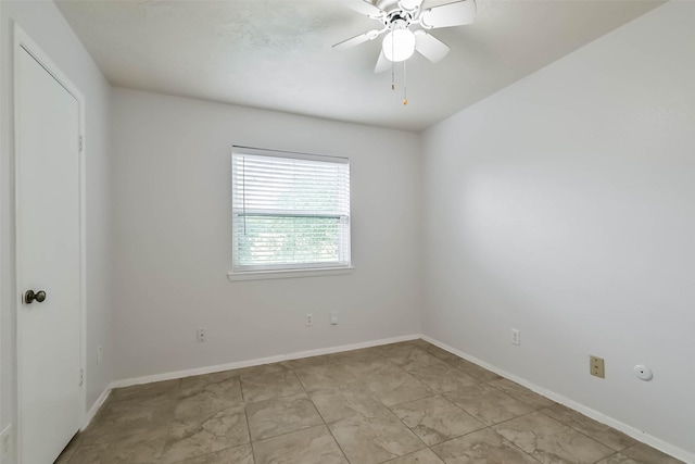 10901 Mesquite Dr, La Porte, TX 77571 - unfurnished room featuring ceiling fan and baseboards