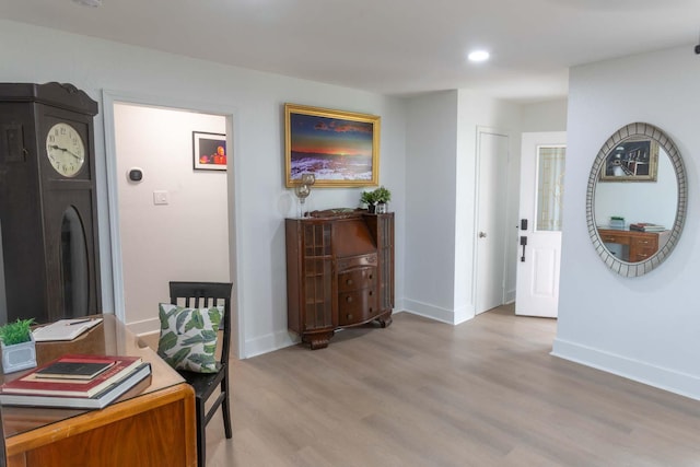 2302 Hewitt Dr, Houston, TX 77018 - home office featuring light wood-style floors, baseboards, and recessed lighting