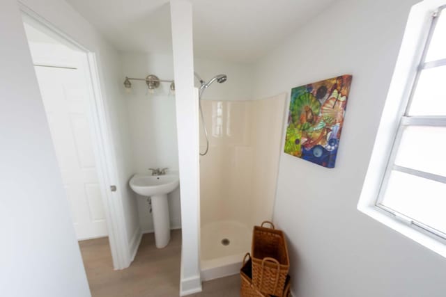 2302 Hewitt Dr, Houston, TX 77018 - full bath with a shower stall and wood finished floors