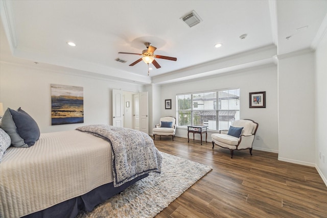 4303 Stonebrook Ln, Missouri City, TX 77459 - bedroom featuring a tray ceiling, crown molding, recessed lighting, wood finished floors, and baseboards