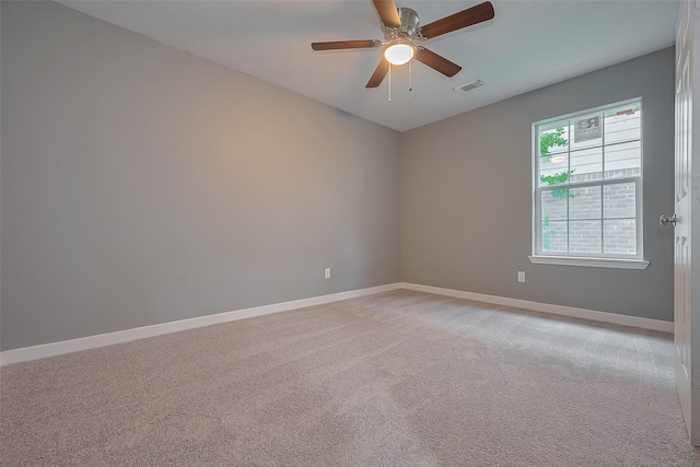 7119 Piney Meadow Ct, Houston, TX 77041 - empty room featuring baseboards, a ceiling fan, and light carpet