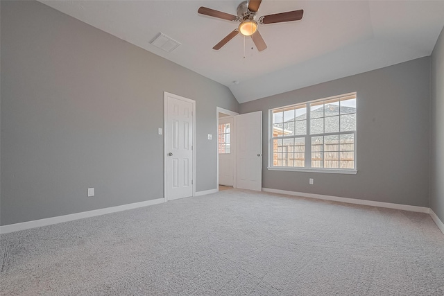7119 Piney Meadow Ct, Houston, TX 77041 - unfurnished room with ceiling fan, baseboards, vaulted ceiling, and light carpet