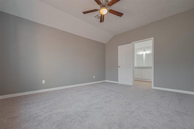 7119 Piney Meadow Ct, Houston, TX 77041 - unfurnished room with light carpet, ceiling fan, baseboards, and vaulted ceiling