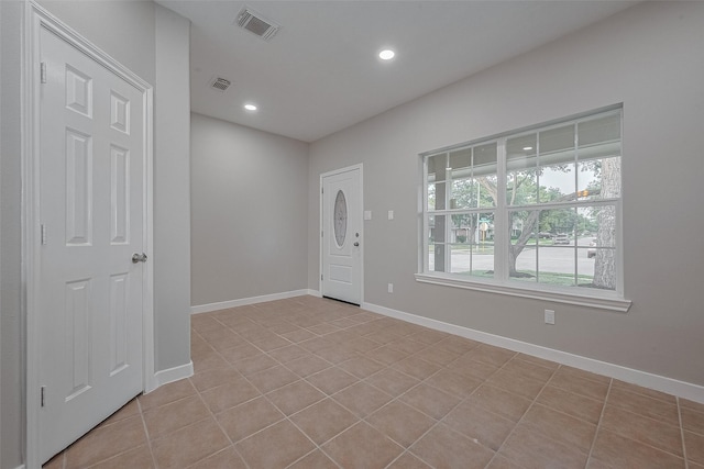 7119 Piney Meadow Ct, Houston, TX 77041 - foyer with recessed lighting, baseboards, and light tile patterned floors