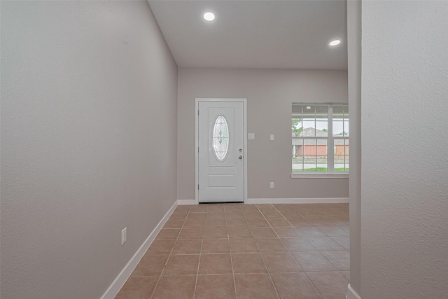 7119 Piney Meadow Ct, Houston, TX 77041 - entrance foyer featuring light tile patterned floors, recessed lighting, and baseboards
