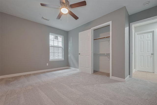 7119 Piney Meadow Ct, Houston, TX 77041 - unfurnished bedroom featuring light carpet, baseboards, a closet, and a ceiling fan