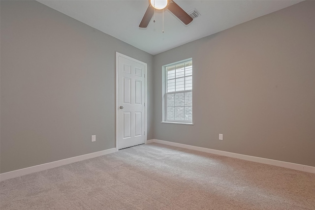 7119 Piney Meadow Ct, Houston, TX 77041 - empty room with ceiling fan, light colored carpet, and baseboards