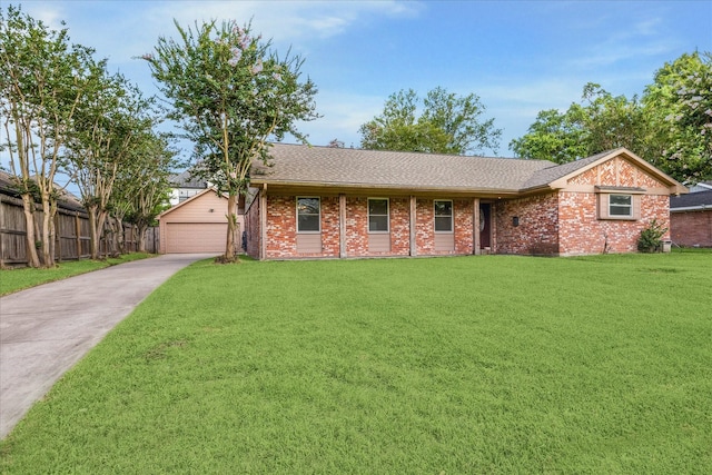 5211 W Bellfort Ave, Houston, TX 77035 - ranch-style house featuring brick siding, a detached garage, an outdoor structure, and roof with shingles