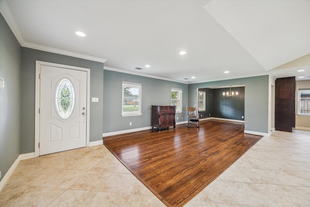 5211 W Bellfort Ave, Houston, TX 77035 - tiled entryway with a chandelier, healthy amount of natural light, crown molding, recessed lighting, and baseboards