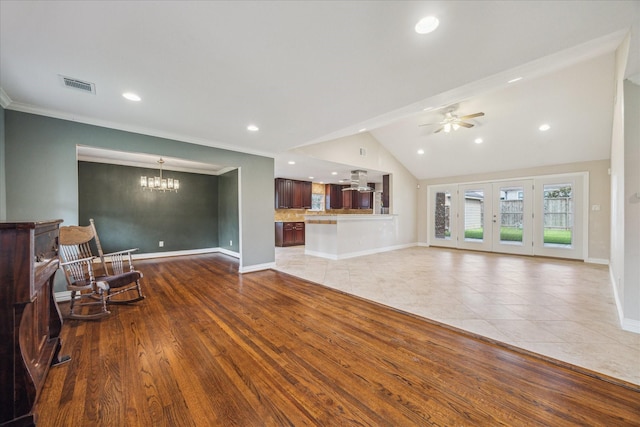 5211 W Bellfort Ave, Houston, TX 77035 - living area with a chandelier, baseboards, recessed lighting, ceiling fan, and lofted ceiling