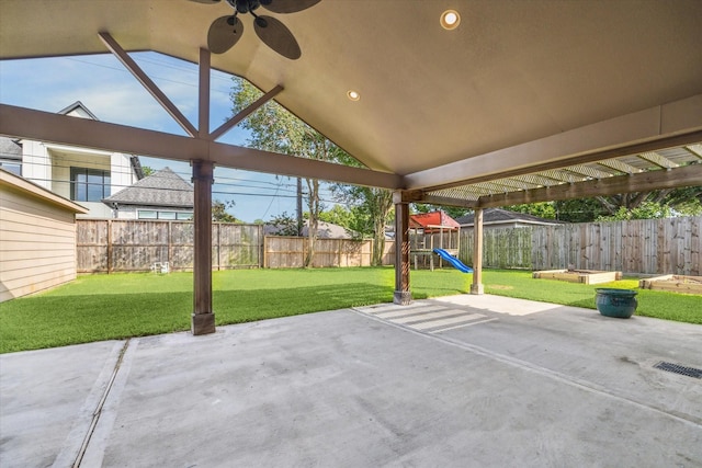 5211 W Bellfort Ave, Houston, TX 77035 - view of patio / terrace with a playground and a ceiling fan