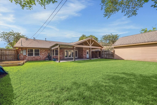 5211 W Bellfort Ave, Houston, TX 77035 - back of house featuring a patio, french doors, and brick siding