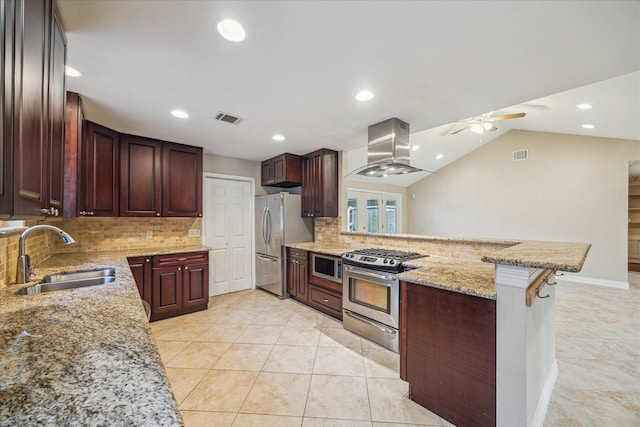 5211 W Bellfort Ave, Houston, TX 77035 - kitchen featuring stainless steel appliances, island exhaust hood, a sink, a peninsula, and ceiling fan