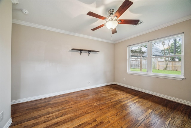5211 W Bellfort Ave, Houston, TX 77035 - unfurnished room with dark wood-style floors, ceiling fan, baseboards, crown molding, and a smoke detector