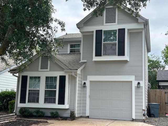 14539 Briton Cove Dr, Houston, TX 77084 - view of front of house with a garage and roof with shingles