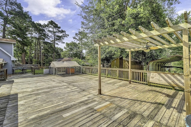 1239 Indian Hill Blvd, Livingston, TX 77351 - wooden terrace with a pergola and view of wooded area