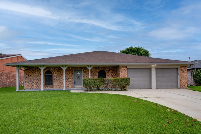 5214 Meadow Crest St, La Porte, TX 77571 - ranch-style home featuring a front lawn, concrete driveway, a garage, brick siding, and a porch