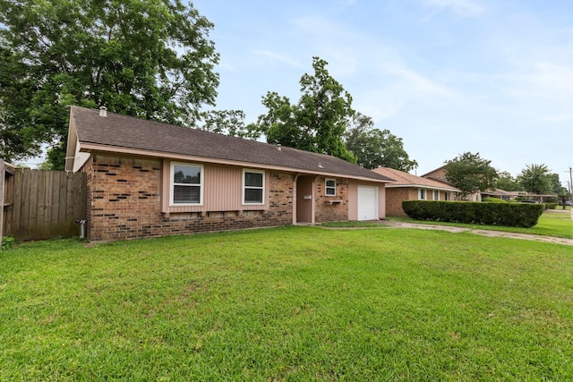 1121 E 13th St, Deer Park, TX 77536 - ranch-style home featuring brick siding, an attached garage, and concrete driveway