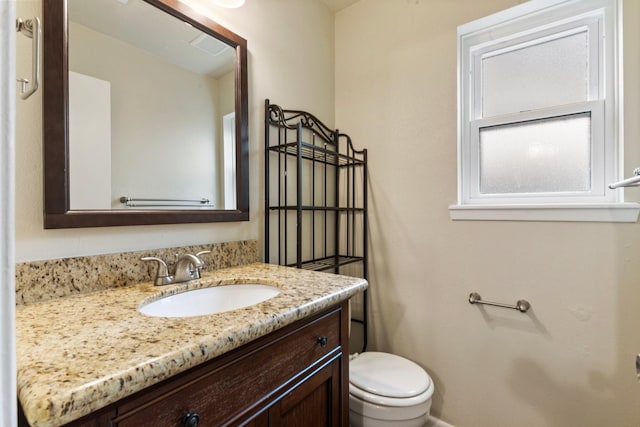 1121 E 13th St, Deer Park, TX 77536 - bathroom with toilet and vanity