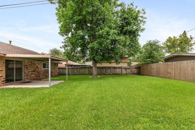 1121 E 13th St, Deer Park, TX 77536 - view of yard with a patio