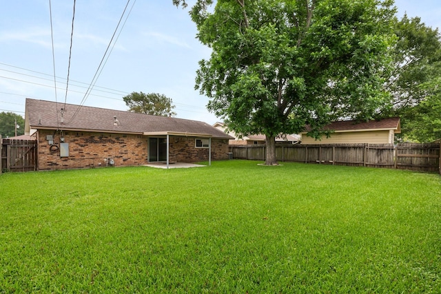 1121 E 13th St, Deer Park, TX 77536 - view of yard featuring a patio area