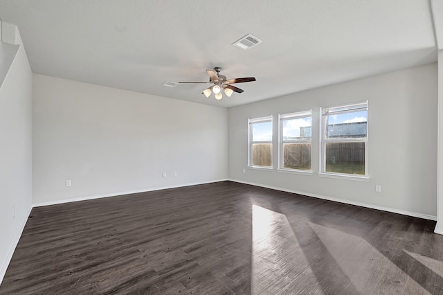 4354 Tulip Oak Dr, Houston, TX 77068 - unfurnished room with dark wood finished floors, ceiling fan, and baseboards