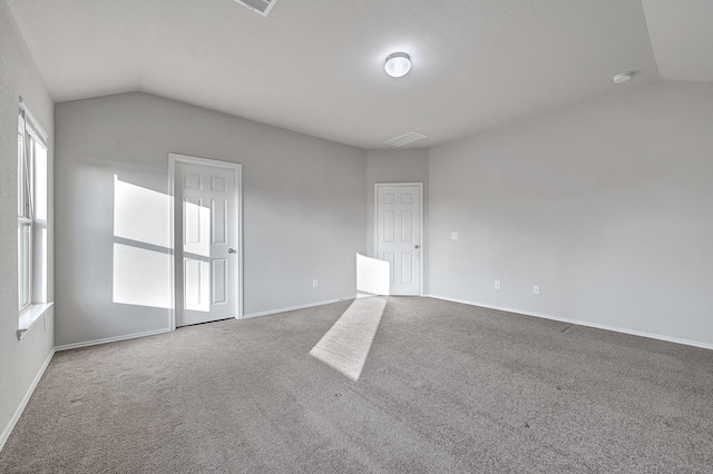 4354 Tulip Oak Dr, Houston, TX 77068 - spare room with vaulted ceiling, carpet floors, plenty of natural light, and baseboards