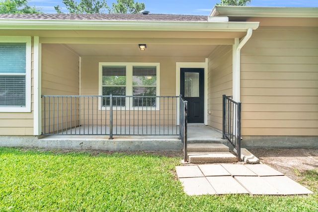 14 Fitzroy Pl, Conroe, TX 77384 - property entrance with a porch