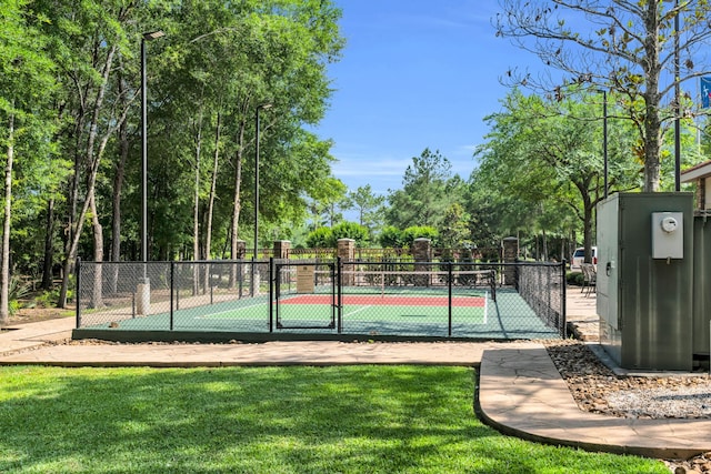 14 Fitzroy Pl, Conroe, TX 77384 - view of tennis court featuring a gate