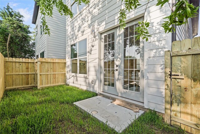 2022 Thonig Rd Unit C, Houston, TX 77055 - view of exterior entry with a gate and french doors